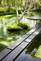 03 big-house-with-beautiful-ponds-as-cooling-elements-beautiful-home-garden-pond