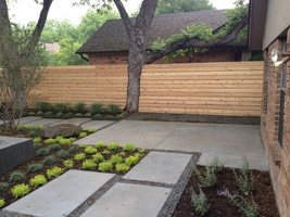 11 backyard-fence-ideas-Landscape-Contemporary-with-bark-mulch-Basalt-Dish (1)