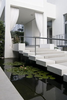 12 w brown-davis-interiors-koi-pond-koi-pond-design-ideas-for-a-simple-and-tranquil-home-landscape