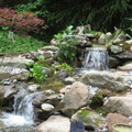 Small-waterfall-with-stones-for-natural-water-garden