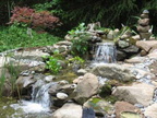 Small-waterfall-with-stones-for-natural-water-garden